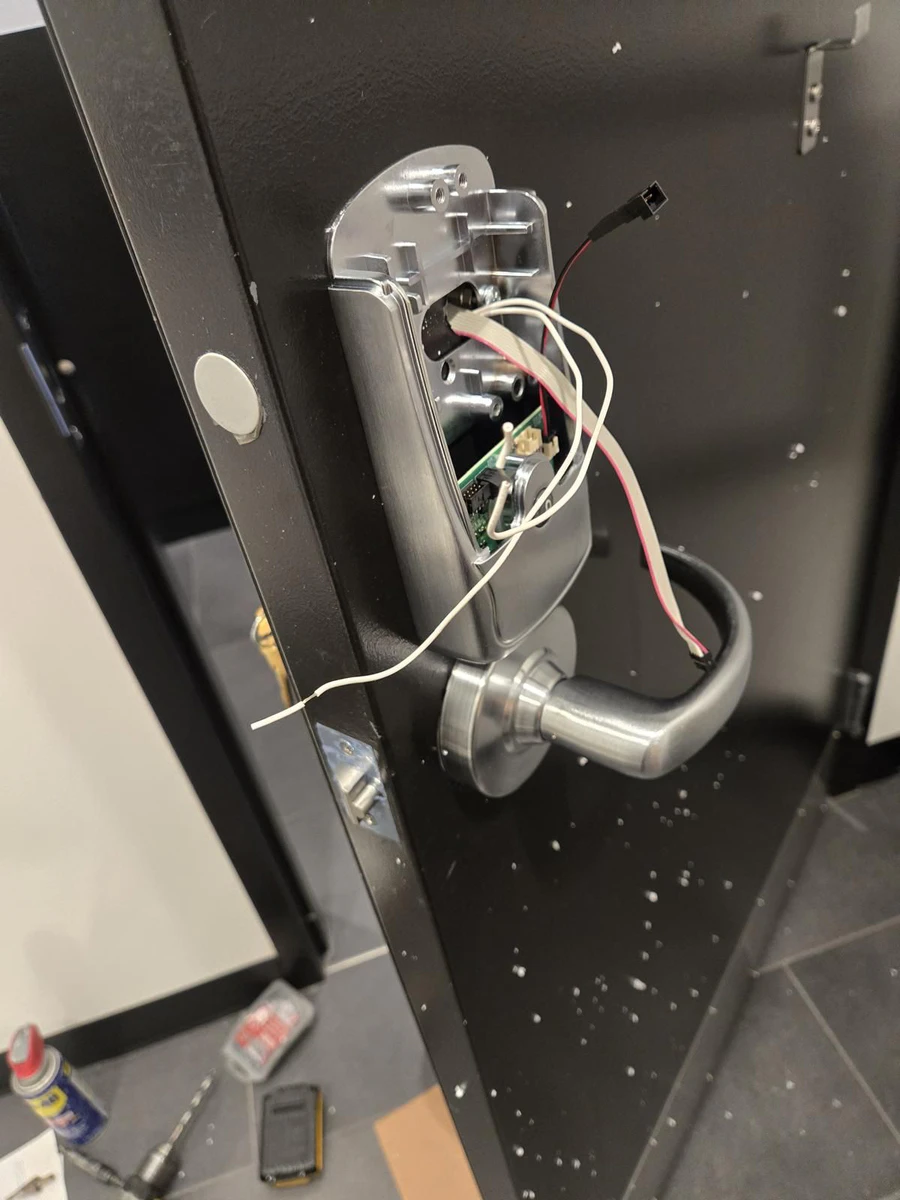 Smart lock and access control wiring on a commercial door in Oakville