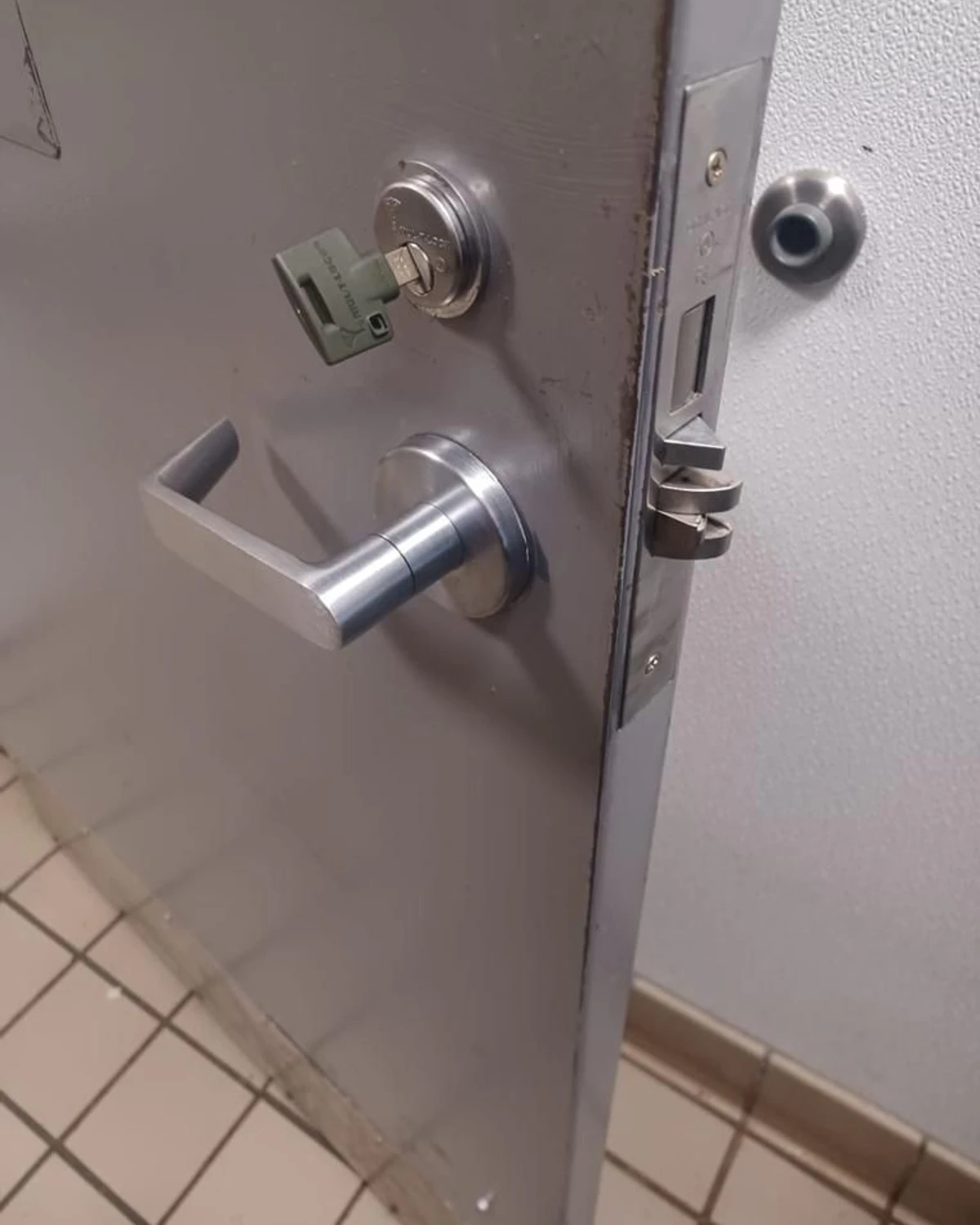 High-security Mul-T-Lock hardware on a commercial door in Orangeville